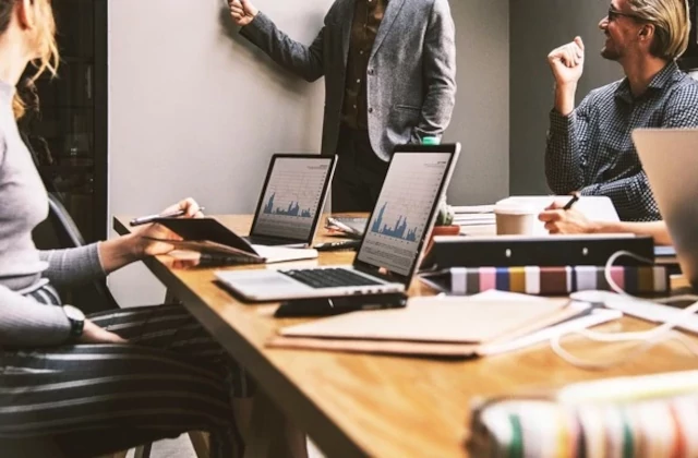 People sitting at conference table